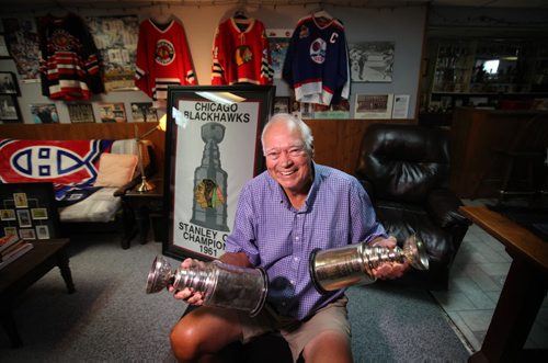 RUTH BONNEVILLE / WINNIPEG FREE PRESS  Portraits of Ab McDonald with his memorabilia bedecked basement with two replica Stanley Cups from the 1960 Montreal Canadiens and the 1961 Chicago Black Hawk  Ab has been on four, back-to-back-to-back  Stanley Cup winning teams, three in Montreal and one in Chicago vs Montreal. He was raised in  Winnipeg, was Jets first captain, and next month Special Olympics is honouring him for his volunteer work at a fund-raising dinner. See Sinclair column. Aug 04, 2016