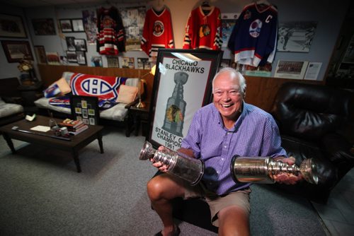 RUTH BONNEVILLE / WINNIPEG FREE PRESS  Portraits of Ab McDonald with his memorabilia bedecked basement with two replica Stanley Cups from the 1960 Montreal Canadiens and the 1961 Chicago Black Hawk  Ab has been on four, back-to-back-to-back  Stanley Cup winning teams, three in Montreal and one in Chicago vs Montreal. He was raised in  Winnipeg, was Jets first captain, and next month Special Olympics is honouring him for his volunteer work at a fund-raising dinner. See Sinclair column. Aug 04, 2016