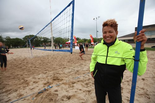 RUTH BONNEVILLE / WINNIPEG FREE PRESS  Volleyball players with the Canada Summer Games Training team practice on the newly built volleyball courts at Sargent Park Thursday while press conference is being held behind them announcing the new facility.  The Sargent Park Beach Volleyball Centre will be the official beach volleyball venue for the 2017 Games. Wanda Guenette, former Olympian and coach for the Canada Games women's team, was coaching the girls at their new facility.   See Ashley Prest story.   Aug 04, 2016