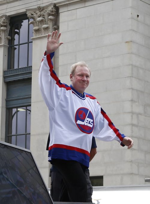 WAYNE GLOWACKI / WINNIPEG FREE PRESS     At the intersection of Portage and Main, Winnipeg Jets Alumnus Thomas Steen waves to the crowd at the NHL  Heritage Classic prmotional event held Friday. Tim Campbell story August 5 2016