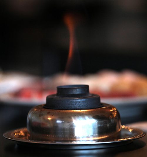 PHIL HOSSACK / WINNIPEG FREE PRESS - A burner's flame climbs at the Asian Hot Pot ready to heat simering pots of savory Korean food. See Alison Gilmore's story.  August 5, 2016