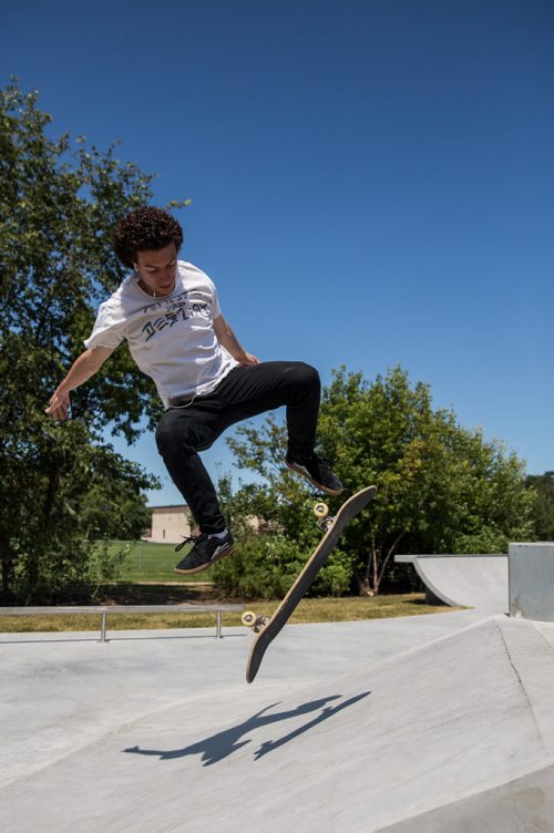 MIKE DEAL / WINNIPEG FREE PRESS The Justin Einarson Memorial Skatepark in Fort Richmond was dedicated by community members, officials from the City of Winnipeg and the Province Sunday afternoon.  Danny Taylor tries out some moves on the newly dedicated skatepark. 160807 - Sunday, August 07, 2016