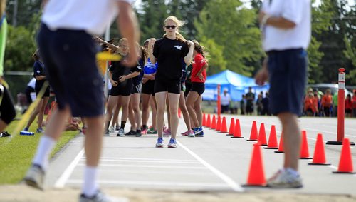 PHIL HOSSACK / WINNIPEG FREE PRESS - Carissa Kennedywaits as the pit is prepped to copmpete in the women's long jump Monday in Steinbach at the SUMMER GAMES. SEE Tim Campbell's story.  See story. August 8, 2016