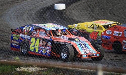 PHIL HOSSACK / WINNIPEG FREE PRESS - Victoria Stutsky #24 manouvres through traffic on a Red River Speedway turn Monday evning. See Dave Sanderson story.  See story. August 8, 2016