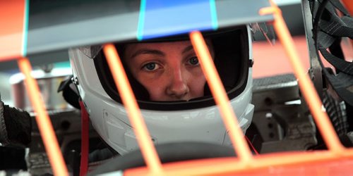 PHIL HOSSACK / WINNIPEG FREE PRESS - Ready to Rumble - Victoria Stutsky peers through the protective payers inside her dirt track race car at  Red River Speedway turn Monday evning. See Dave Sanderson story.  See story. August 8, 2016