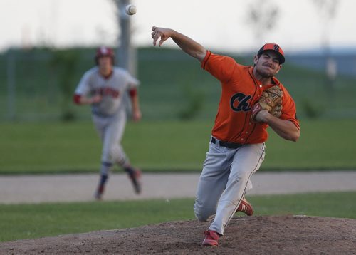 JOHN WOODS / WINNIPEG FREE PRESS Winnipeg South Chiefs pitcher Cole Paquin (12) throws against Elmwood Giants in game 2 of the Manitoba Junior Baseball final at Charleswood Park, Monday, August 8, 2016. The Chiefs went on to defeat the Giants.