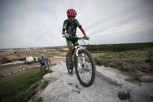 JOHN WOODS / WINNIPEG FREE PRESS Nathan Man and the Manitoba Cycling mountain bike team practices at Bison Butte, a new racing venue in Winnipeg, Tuesday, August 9, 2016.