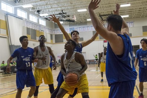 ZACHARY PRONG / WINNIPEG FREE PRESS  Number 11 Chris Alexander of the Winnipeg Gold goes for a shot during the Manitoba Summers Games Male Basketball final against the Winnipeg Blue on August 10, 2016. The Winnipeg Gold eventually came out on top with a 82-75 win.