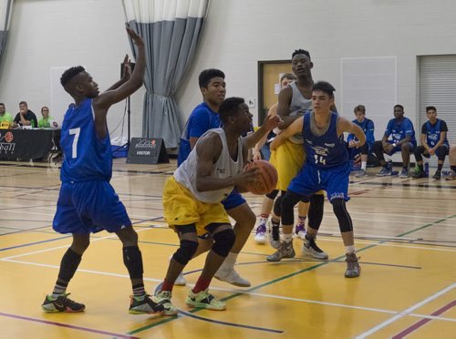 ZACHARY PRONG / WINNIPEG FREE PRESS  Number 7 Fabrice Kazadi of the Winnipeg Gold goes for a shot during the Manitoba Summers Games Male Basketball final against the Winnipeg Blue on August 10, 2016. The Winnipeg Gold eventually came out on top with a 82-75 win.