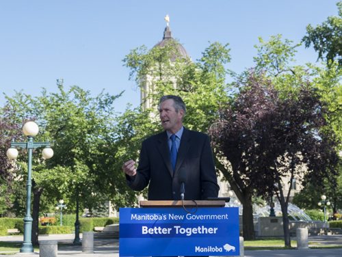 ZACHARY PRONG / WINNIPEG FREE PRESS  Premier Brian Pallister speaks to reporters at the Legislative grounds about his government's first 100 days in office. August 11, 2016.