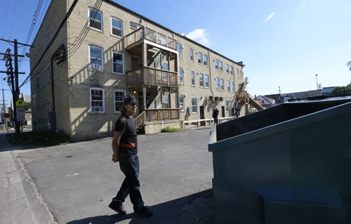 WAYNE GLOWACKI / WINNIPEG FREE PRESS      Scott Ballantyne lives in the Mansfield Court apartments on Ellice Ave. at McGee St., a body was found in this dumpster at the back of the building. Alex Paul story August 11 2016