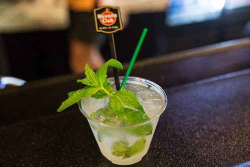 MIKE DEAL / WINNIPEG FREE PRESS Ben MacPhee-Sigurdson takes us on a tour of Folklorama pavilion's to sample various drinks and food. A mojito ready for consumption at the Cuban Pavilion Tuesday evening. 160809 - Tuesday, August 09, 2016