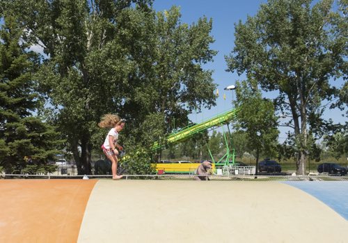 ZACHARY PRONG / WINNIPEG FREE PRESS  Abby Williams, 6, plays at the Tinkertown Family Fun Park. August 11, 2016.