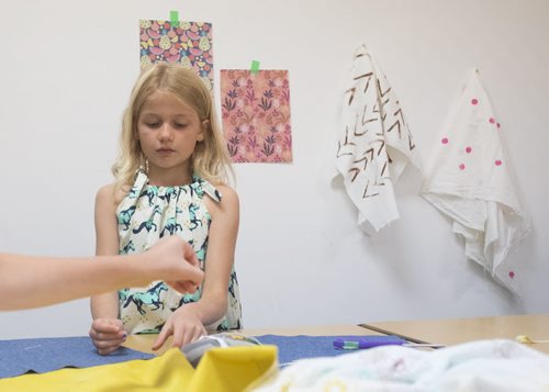 ZACHARY PRONG / WINNIPEG FREE PRESS  Sadie, 8, works on her tote bag at the Sew Fun Studio. August 12, 2016.