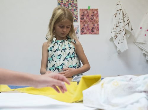 ZACHARY PRONG / WINNIPEG FREE PRESS  Sadie, 8, works on her tote bag at the Sew Fun Studio. August 12, 2016.