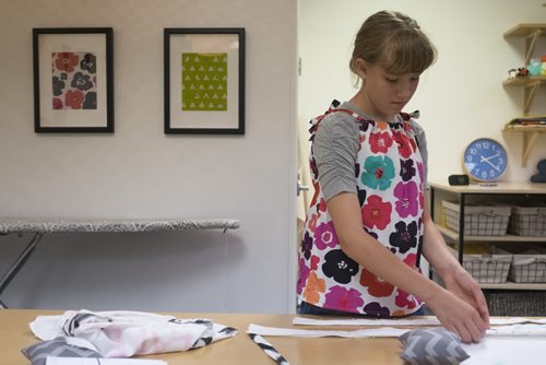 ZACHARY PRONG / WINNIPEG FREE PRESS  Abby, 11, works on her tote bag at the Sew Fun Studio. August 12, 2016.