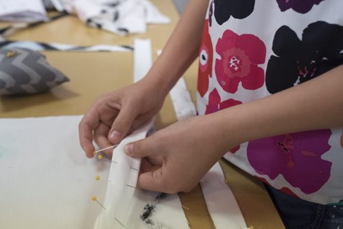 ZACHARY PRONG / WINNIPEG FREE PRESS  Abby, 11, works on her tote bag at the Sew Fun Studio. August 12, 2016.