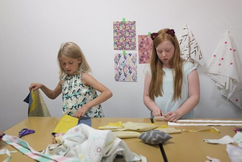 ZACHARY PRONG / WINNIPEG FREE PRESS  Sadie, 8, (from left) and Lauren, 12, work on their tote bags at the Sew Fun Studio. August 12, 2016.