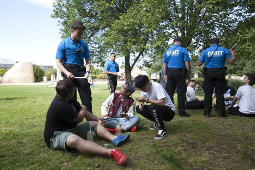 RUTH BONNEVILLE  / WINNIPEG FREE PRESS  Members of Cadet Unit talk to Pokemon go players about playing it safe at the Forks Friday.  The Forks is a popular spot for Pokemon Go gamers so the Cadets set up a charging station and info booth to remind players to keep their heads up while playing to avoid accidents.   Standup photo   Aug 12 / 2016