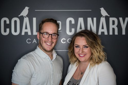 MIKE DEAL / WINNIPEG FREE PRESS Tom Jansen and Amanda Buhse are co-founders of the now-ubiquitous Coal & Canary Candle Co., a local business who has leveraged Instagram in a big way. They just opened a new office/production house on Sanford Street to meet demand. 160810 - Wednesday, August 10, 2016