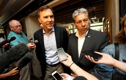 TREVOR HAGAN / WINNIPEG FREE PRESS Canada's Finance Minister, Honourable Bill Morneau, and Dan Vandal, at Stella's on Provencher, Monday, August 15, 2016.