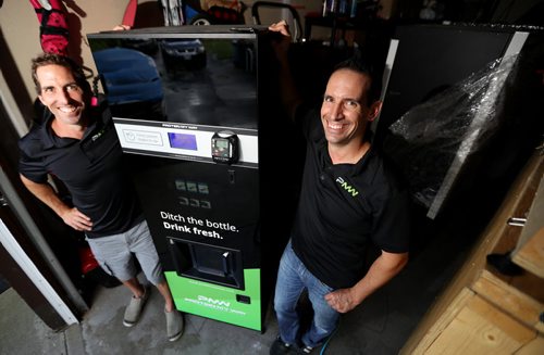TREVOR HAGAN / WINNIPEG FREE PRESS Brothers, Graham and Bryce Folster, who along with their sister Erin, and friend Derek Penner, have launched Protein My Way, a vending machine that dispenses protein shakes, Tuesday, August 16, 2016.