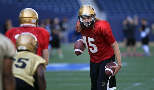 PHIL HOSSACK / WINNIPEG FREE PRESS - Bison quarterback Theo Deezar sets up a practice drill at Investors Group Field Tuesday afternoon. See Jason Bell story.  August 16, 2016