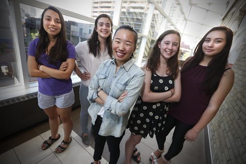 JOHN WOODS / WINNIPEG FREE PRESS From left Pamela Campos, Nicole Kaneski, Soomin Han, Ivy Deseiolles and Brianna Jonnie are part of the Strong Girls, Strong World program and photographed at the downtown Y Tuesday, August 16, 2016. Strong Girls, Strong World is a program that has been running out of the downtown Y for the past several months. The young women are aged 14-20, and Strong Girls, Strong World is a part of a nationwide project funded by Status of Women and Plan Canada, in partnership with the YMCA/YWCA.