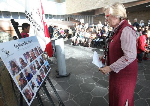 JOE BRYKSA / WINNIPEG FREE PRESS Minister of Indigenous and Northern Affairs Carolyn Bennett looks at board of survivors- Today at the Canadian Museum for Human Rights the Government of Canada apologized for the relocation of the Sayisi Dene from Little Duck Lake to North Knife River and Churchill in the 1950s and 1960s - Aug 17, 2016 -( See Ashleys story)