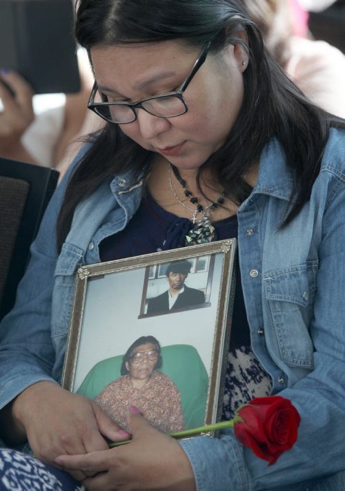 JOE BRYKSA / WINNIPEG FREE PRESS  Jennifer Tom of Tadoule Lake gets emotional holding a picture of her grandmother Mamie Tom who died of cancer in 1993- Today at the Canadian Museum for Human Rights the Government of Canada apologized for the relocation of the Sayisi Dene from Little Duck Lake to North Knife River and Churchill in the 1950s and 1960s - Aug 17, 2016 -(  See Ashleys story)