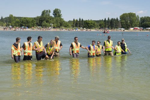 ZACHARY PRONG / WINNIPEG FREE PRESS  Beach Safety Officers search the waters at Birds Hill Park for a possible growing victim. August 17, 2016.