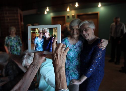 PHIL HOSSACK / WINNIPEG FREE PRESS -  Club 56 is a group of couples who all married in 1956. Hilda Heinrichs (left) and Martha Neufeld  pose for a members iPad before the group's 60th anniversary dinner. See Jen Zoratti story.  August 17, 2016