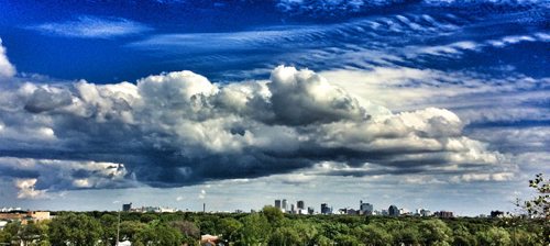 BORIS MINKEVICH / WINNIPEG FREE PRESS PHOTO ILLUSTRATION Weather photo illustration. Clouds hang over the Winnipeg skyline. Photo taken from Westview Park, or "Garbage Hill" as it's commonly known as. No story to go with this photo. This file was taken with the iPhone and processed with the Snapseed app. August 18, 2016