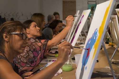 ZACHARY PRONG / WINNIPEG FREE PRE  Natalie Dickens, left, and Carla Monroe paint "Andy Warhol inspired" paintings during a class open to the public at the Winnipeg Art Gallery (WAG) Studio on August 18, 2016. Tickets to the event went to support the WAG Youth and Outreach Programs.