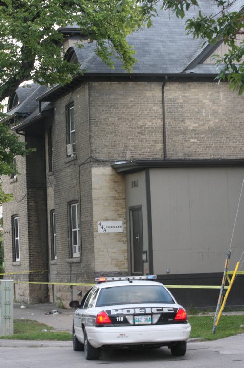 JOE BRYKSA / WINNIPEG FREE PRESS  Winnipeg Police are guarding a scene of a beating on the outside of 448 Cumberland Friday morning   - Aug 19, 2016 -(  Breaking News)