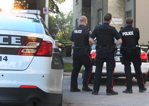 JOE BRYKSA / WINNIPEG FREE PRESS Winnipeg Police are guarding a scene of suspicious death outside of 448 Cumberland Friday morning  Items on outside stairs at scene, including womens clothing  - Aug 19, 2016 -(  Breaking News)