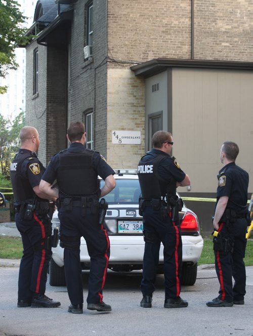 JOE BRYKSA / WINNIPEG FREE PRESS Winnipeg Police are guarding a scene of suspicious death outside of 448 Cumberland Friday morning  Items on outside stairs at scene, including womens clothing  - Aug 19, 2016 -(  Breaking News)