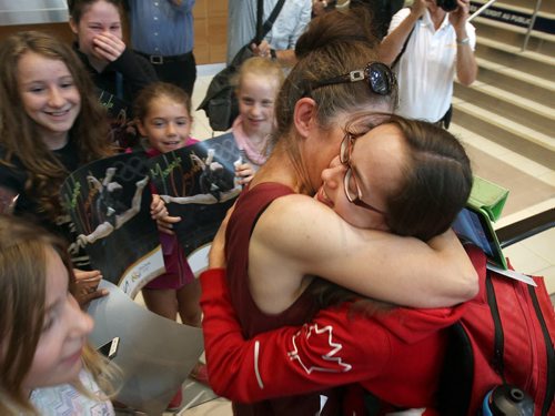 JOE BRYKSA / WINNIPEG FREE PRESS Brandon, Manitoba gymnast Isabela Onyshko gets a hug from her aunt as she arrives home from the Olympics in Brazil at Richardson International Airport friday morning - Aug 19, 2016 -(  Breaking News)