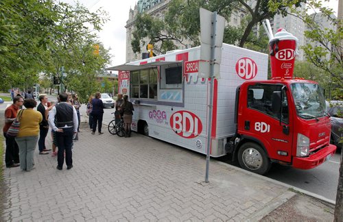 BORIS MINKEVICH / WINNIPEG FREE PRESS A general photo of the all new BDI mobile truck was on Broadway Ave. near Garry Street. Photo taken over the lunch hour. The new mobile BDI truck hit the streets less than a week ago. The owner of the truck says lineups are just as long as the original BDI so far. August 19, 2016
