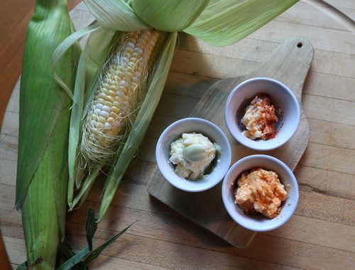 RUTH BONNEVILLE  / WINNIPEG FREE PRESS  ENT Food Front For Wendy King's Corn-on-the-cob toppings.   Parmesan garlic butter (cream), seasoned apricot butter (orange, right) and Simple Sriracha (rear).  Aug 19 / 2016