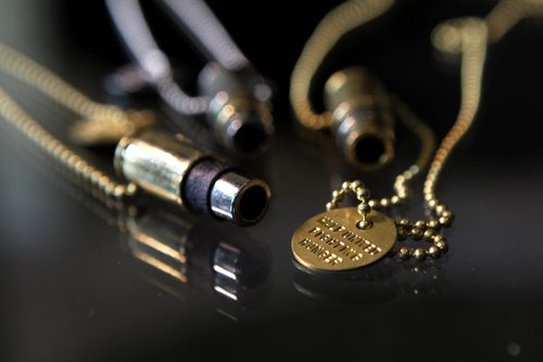 RUTH BONNEVILLE  / WINNIPEG FREE PRESS  Threads Column: Half United - a line of necklaces made from bullet casings where a portion of the proceeds go to fight hunger in third world countries.  They are sold here in Winnipeg at Style Bar on River at Osborne but are made by two designers in the US.  Aug 19 / 2016