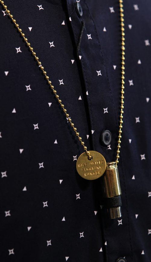 RUTH BONNEVILLE  / WINNIPEG FREE PRESS  Threads Column: Half United - a line of necklaces made from bullet casings where a portion of the proceeds go to fight hunger in third world countries.  They are sold here in Winnipeg at Style Bar on River at Osborne but are made by two designers in the US.  Aug 19 / 2016