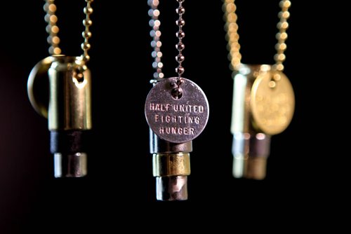 RUTH BONNEVILLE  / WINNIPEG FREE PRESS  Threads Column: Half United - a line of necklaces made from bullet casings where a portion of the proceeds go to fight hunger in third world countries.  They are sold here in Winnipeg at Style Bar on River at Osborne but are made by two designers in the US.  Aug 19 / 2016