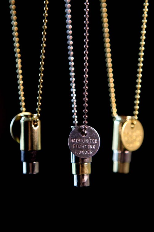 RUTH BONNEVILLE  / WINNIPEG FREE PRESS  Threads Column: Half United - a line of necklaces made from bullet casings where a portion of the proceeds go to fight hunger in third world countries.  They are sold here in Winnipeg at Style Bar on River at Osborne but are made by two designers in the US.  Aug 19 / 2016