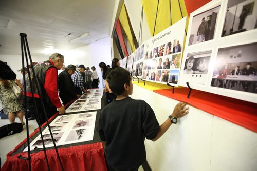 RUTH BONNEVILLE / WINNIPEG FREE PRESS   Photographs of the remaining Sayisi Dene survivors that were forced to leave their home in Little Duck Lake 60 years ago by the government of Canada were on display in Tadoule Lake Tuesday.   Minister Carolyn Bennett made a formal apology to the residents of Tadoule Lake on behalf of the Government of Canada.   See Alex Paul story.   Aug 16 / 2016