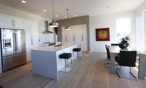 WAYNE GLOWACKI / WINNIPEG FREE PRESS   Homes.   Kitchen and dining area at 34 Big Sky Drive in Oak Bluff West. The contact is Artista Homes sales rep Jennifer Gulay. Todd Lewys  story  August 22 2016