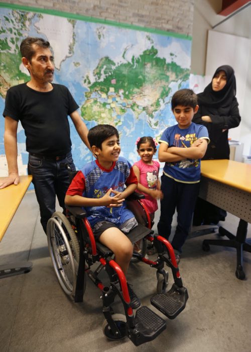 WAYNE GLOWACKI / WINNIPEG FREE PRESS   Arriving in Winnipeg last winter as Syrian refugees, parents Zekariye (father) and Fatma (mother)  El Ahmar with their children from left, Ahmed, Shahad and Muhammed at the Living English program, a summertime English language classes for parents and kids at the downtown RRC campus.Carol Sanders story  August 22 2016