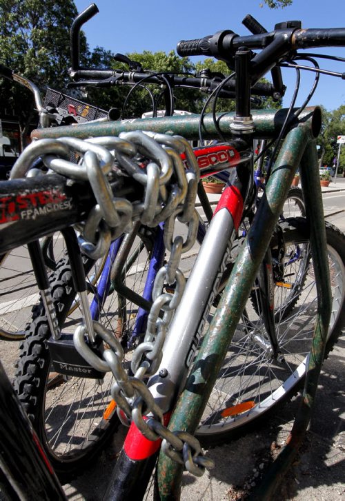 BORIS MINKEVICH / WINNIPEG FREE PRESS Illustrative photos of bikes locked up in Winnipeg. Photos taken on Sherbrook Street between Wolseley Ave. and Westminister Ave. Followup to the Bicycle Theft  Awareness/Prevention: Lock it, or lose it press conference. August 22, 2016