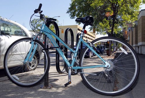 BORIS MINKEVICH / WINNIPEG FREE PRESS Illustrative photos of bikes locked up in Winnipeg. Photos taken on Sherbrook Street between Wolseley Ave. and Westminister Ave. Followup to the Bicycle Theft  Awareness/Prevention: Lock it, or lose it press conference. August 22, 2016