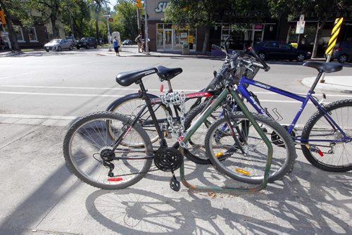 BORIS MINKEVICH / WINNIPEG FREE PRESS Illustrative photos of bikes locked up in Winnipeg. Photos taken on Sherbrook Street between Wolseley Ave. and Westminister Ave. Followup to the Bicycle Theft  Awareness/Prevention: Lock it, or lose it press conference. August 22, 2016